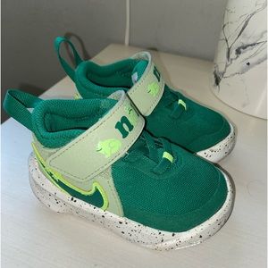 Nike green baby shoes.